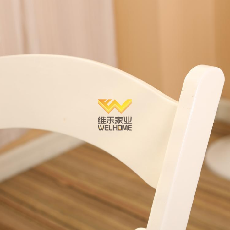 White wooden folding chair for wedding/event